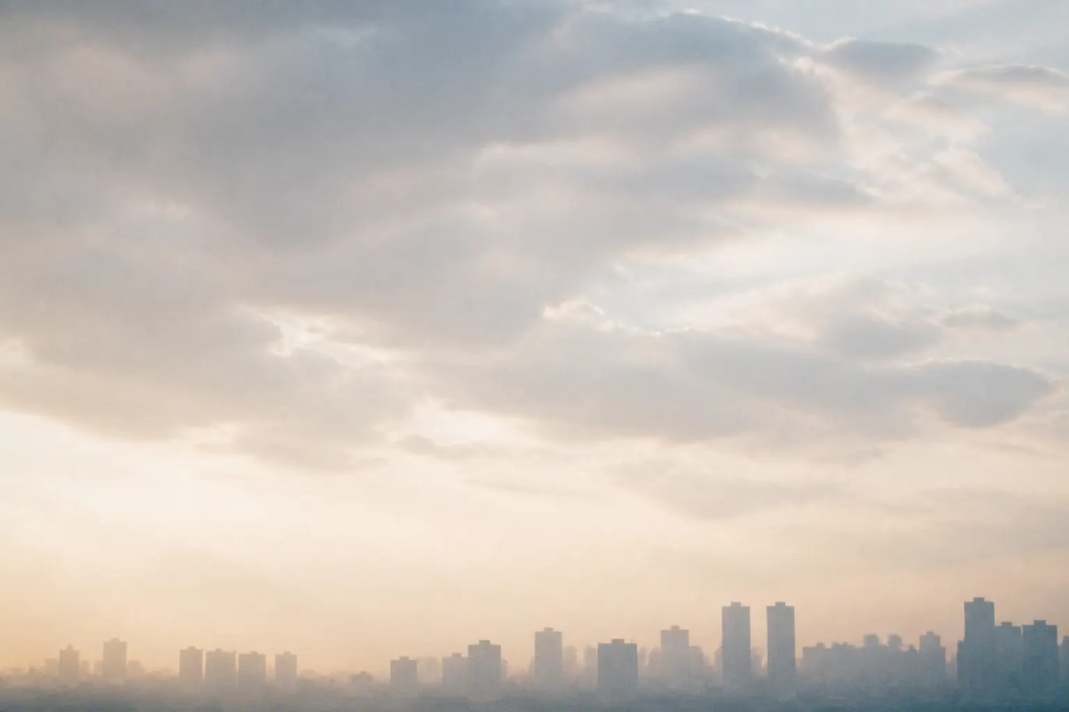 Urban skyline under soft daylight